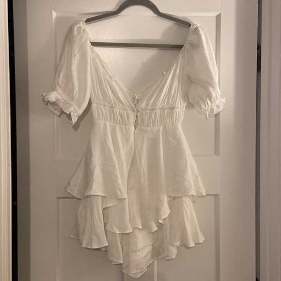 New with tags! Has a super subtle cheetah print (white on white). - Picture 2 of 3